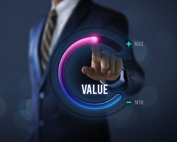 Growth value, increase value, value added or business growth concept. Businessman is pulling up circle progress bar with the word VALUE on dark tone background.
